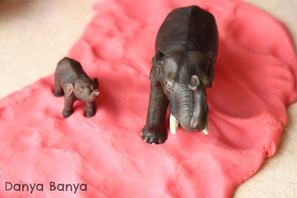 Making elephant footprints in playdough