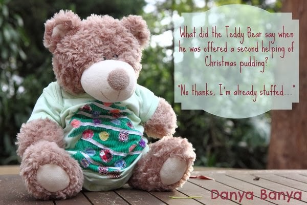 Teddy Bear wearing Christmas onesie (plus joke)