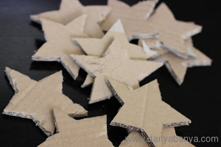 Cut out some stars from corrugated cardboard