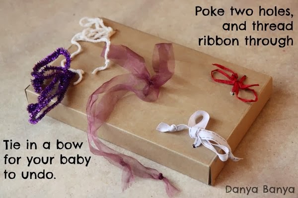 baby toy with ribbons