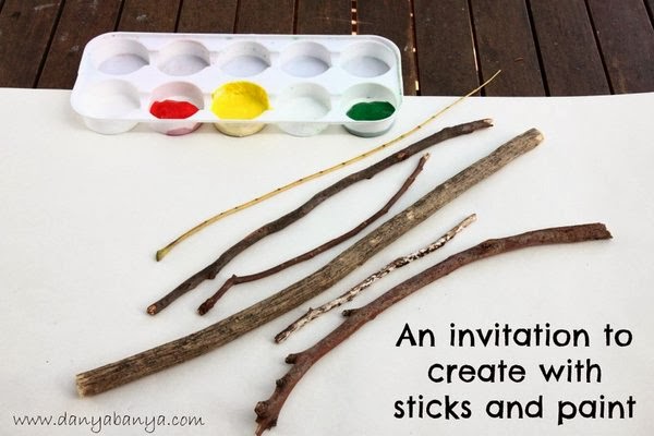 An invitation to create with sticks and paint