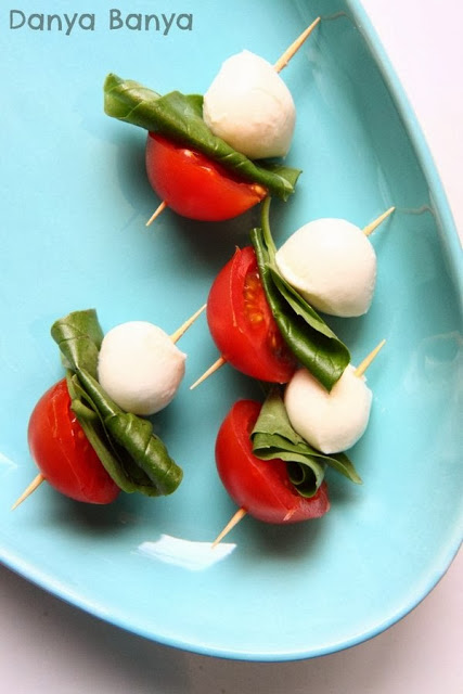 Caprese salad: a simple finger food for the festive season. Great for Christmas parties, especially with the red, white and green colours!