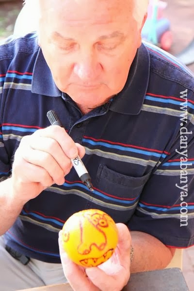 Drawing faces on oranges