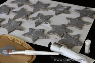 Paint and glitter corrugated cardboard stars