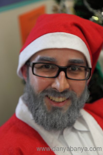 Mr Banya dressed as Santa with white hairspray on his beard