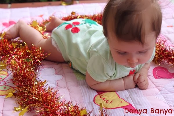 3 month old baby doing tummy time