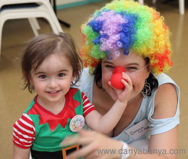 JJ squeezing her mummy's red clown nose